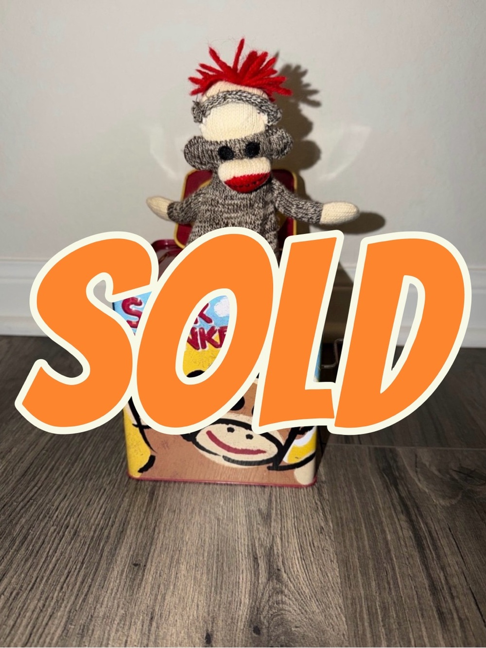 Jack-in-the-box sock monkey